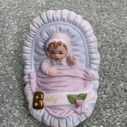 Vintage 1987 Enesco baby in basket from the growing up girls collection