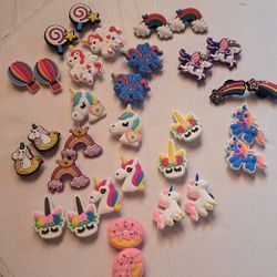 Unicorn croc charms.  32
