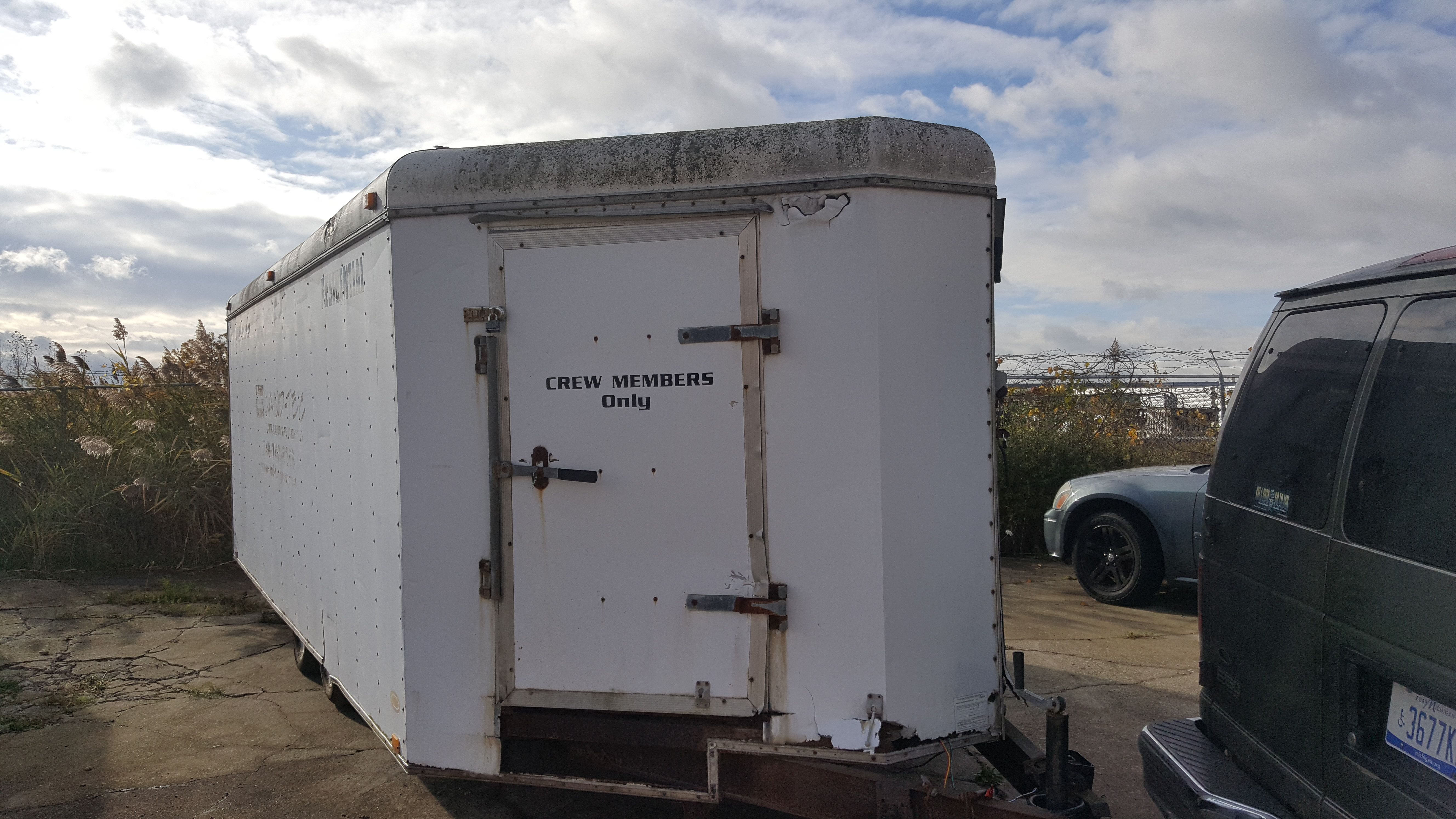 25 FOOT ENCLOSED TRAILER WITH 2 DROP GATES