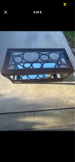 Dark wood glass coffee table with cool design