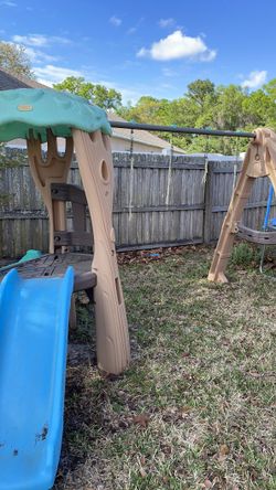 Kids out doors swing, slide, basket ball