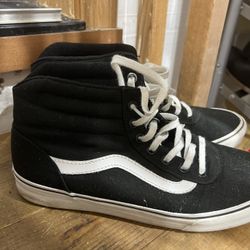 Black and white Vans 