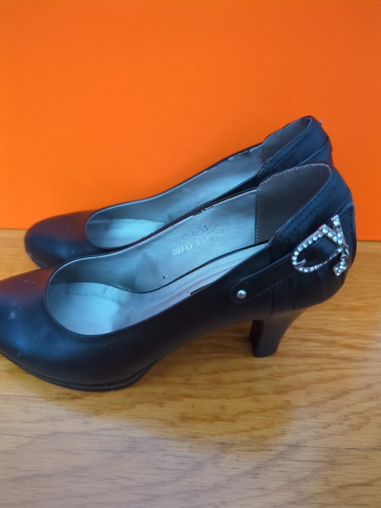 Black Heel Pumps- Color Black ,Size 7, 2 Inches Heel ,Material Leather 