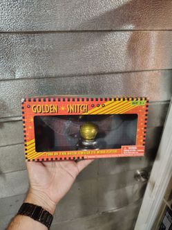 Golden snitch from The Wizarding World of Harry Potter.