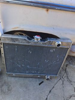 ALUMINUM RADIATOR!! NEW... JUST BEEN SITTING AROUND!! 75$