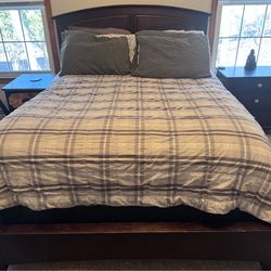 Dark hardwood queen size bed