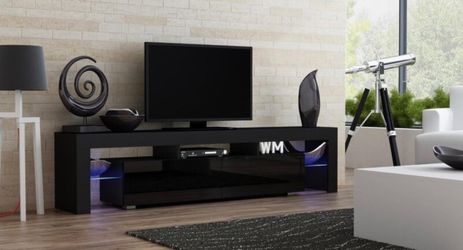 Brand new black led tv stand ( led changing color lights ) 72 inches length fits up to 85 inch tv