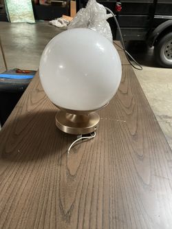 Three Globe Lighting Fixtures