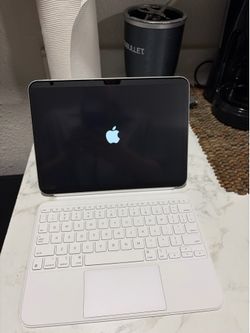 iPad a16 128gb with Apple Magic Keyboard