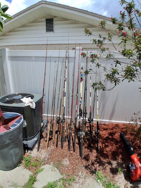 Fishing poles and Vintage tackle box