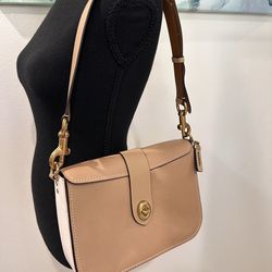 Coach Page pebbled cream purse