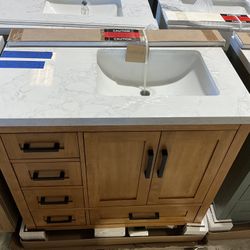 36” Bathroom Vanity in teak , single sink soft close solid wood with vanity top in white  $575  Luke’s liquidations warehouse Address:  2434 N Forsyth