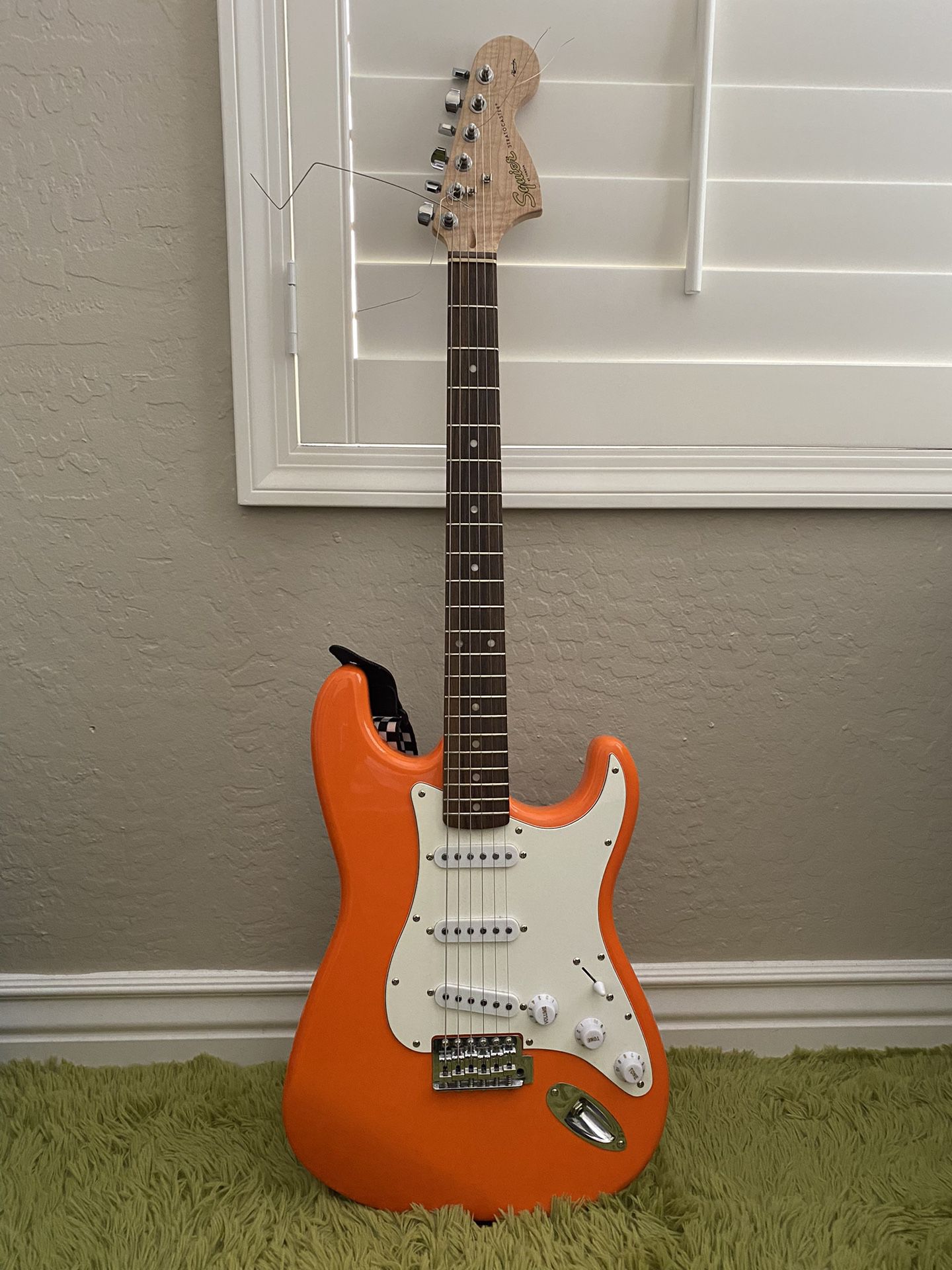 Orange Fender Squier Stratocaster