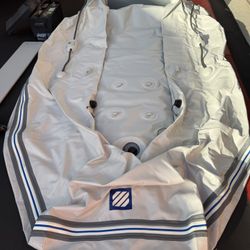 West Marine Php 310 Inflatable Boat. With electric motor.