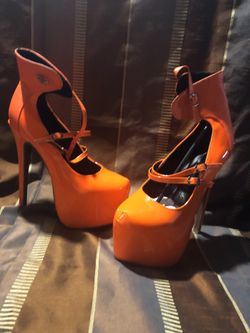 Metallic orange high heels