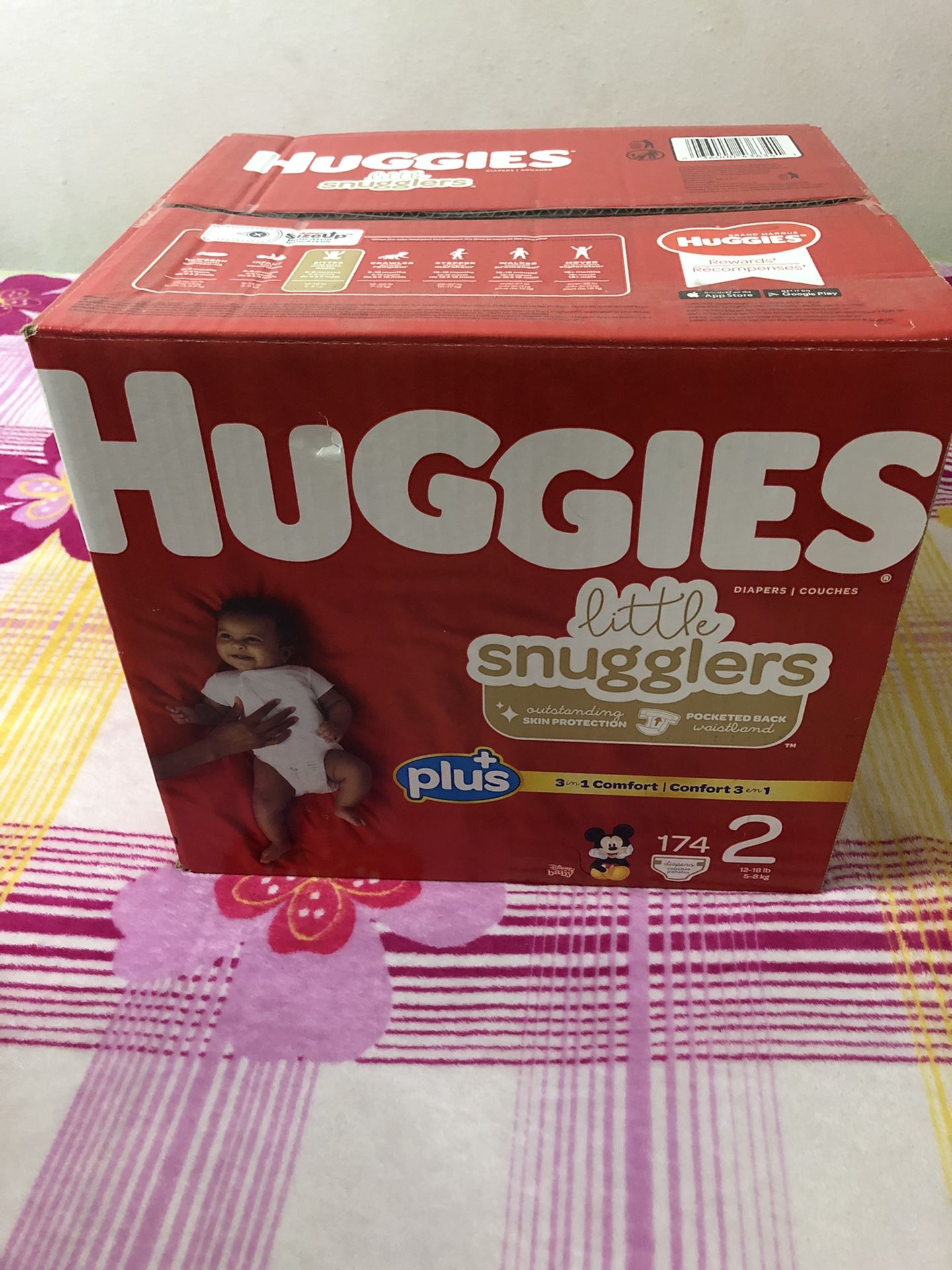 Brand new box of Huggies size 2