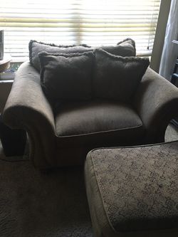 Larger overstuffed chair and ottoman