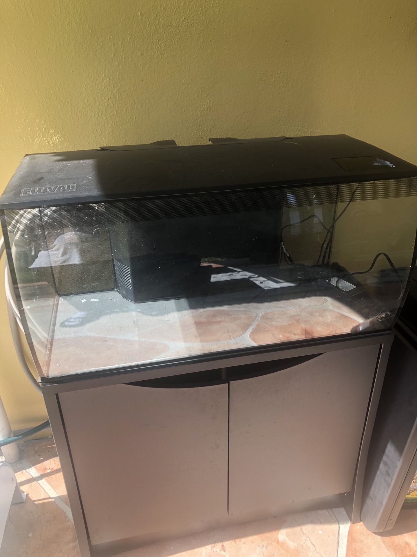 30 Gal. Fluval Aquarium With/Black Stand & Aquarium Base Cushion.