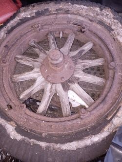 Model t tire & wheel. Wooden spokes own a piece of history
