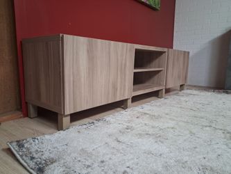 Like new blonde wood tv stand.