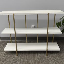 Modern, minimalist console shelving unit with a clean, upscale look. 