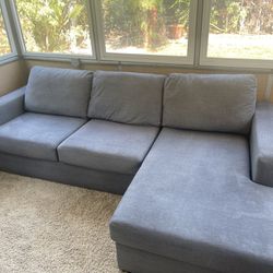 Grey 2 Piece Sectional Couch with Right hand facing chaise