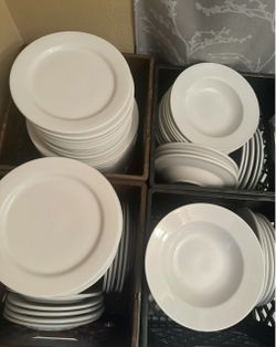 Plates, salad plates, water glass and champagne glass