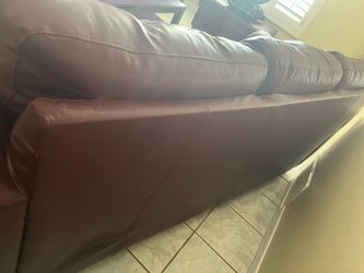 Burgundy red leather couch