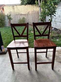 Two wooden high chairs for free
