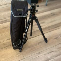 Manfrotto 302-B Pro tripod, Nikon Canon cameras