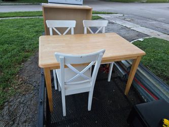 4ft x 2.5ft solid wood table with 3 wooden chairs