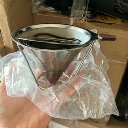 The image shows a double-layered stainless steel coffee dripper, also known as a pour-over coffee filter or cone. 