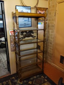 Wood shelf  with glass shelves in center
