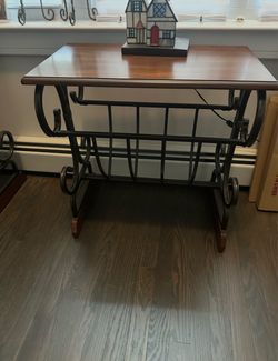 Three end tables available with magazine rack underneath.