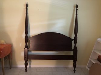 Queen size 4 poster bed/with clean mattress and box spring.