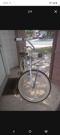 26" White Firmstrong Urban Lady Style Speed Women's Beach Cruiser Bike with basket and cupholder.