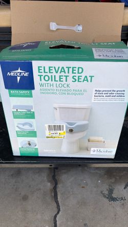 Elevated toilet seat with lock