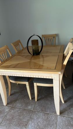 Dining table with six chairs complete set and have the extension