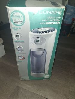 Air conditioner/cool mist humidifier