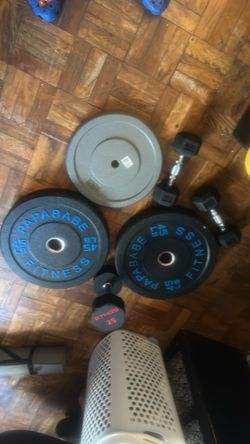 2 45lbs plate 2”, 50lbs 1”, 1 dumbbell 25lb & 2 dumbbell 10lbs each
