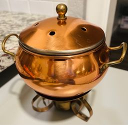 Vintage polished copper warming pot