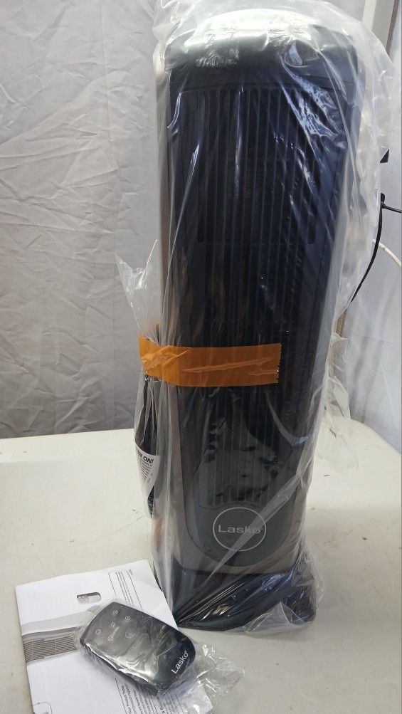 New Lasko 751320 Ceramic Tower Heater With Remote Control.