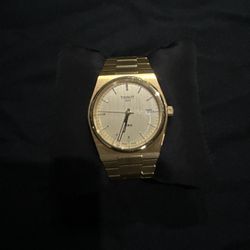 Stainless Steel And Gold Tissot