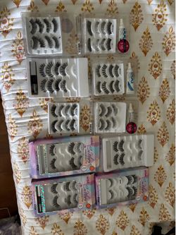 Tons of women’s lashes and make up brushes brand new in box