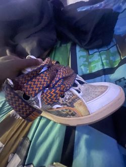 Sneaker with Snakeskin Print and Orange Laces