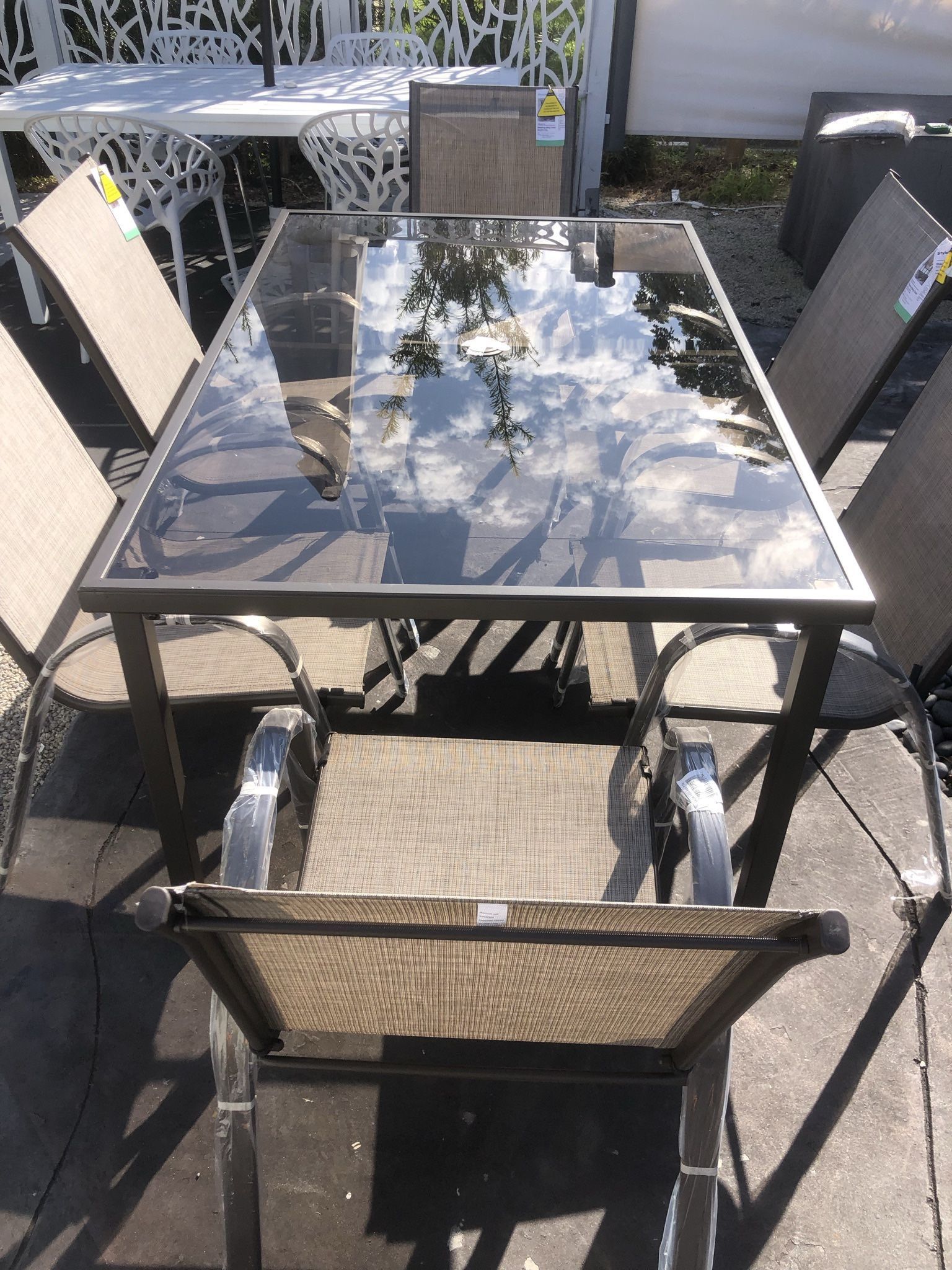 Outdoor Patio Tempered Frosted Glass NEW Table With 6 Outdoor Patio Aluminum Stackable NEW Chairs