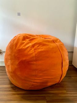 Jumbo orange velvet bean bag chair