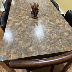 Table with 4 chairs  and 3 Seat Sofa for sale.