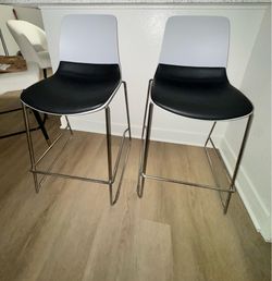 White and Black Chairs
