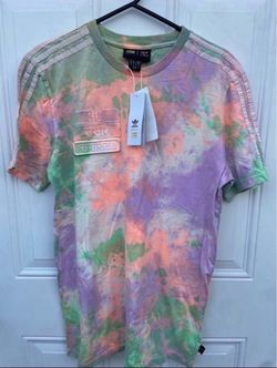 Adidas Pharrell shirt size medium. retails 80 dollars